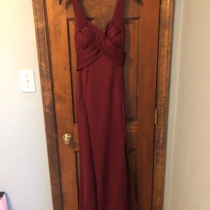 A burgundy prom dress